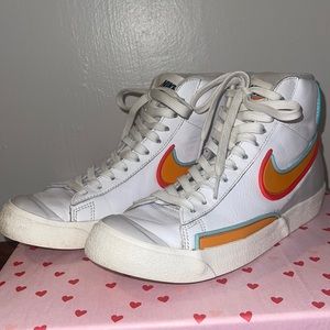 Nike Blazer Mid 77
Infinite Kumquat - orange, blue, red, and white